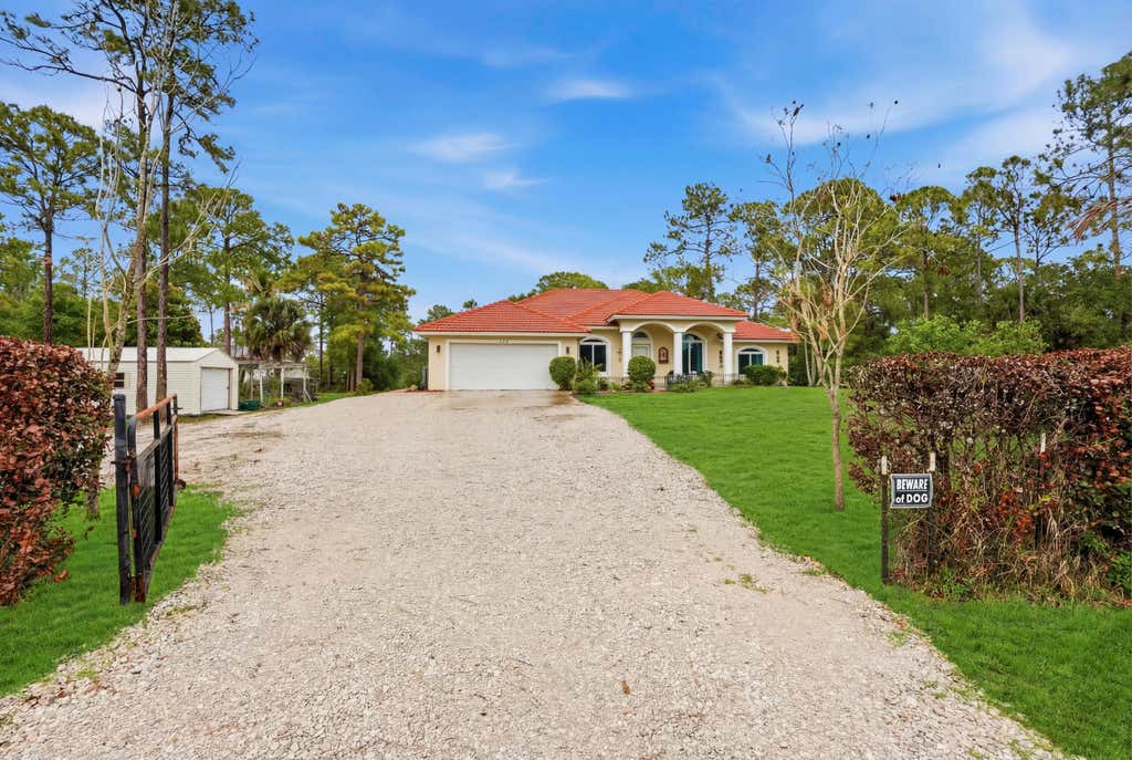 Photo of 15327 64th Place N, The Acreage, FL 33470 (MLS # B26002991)