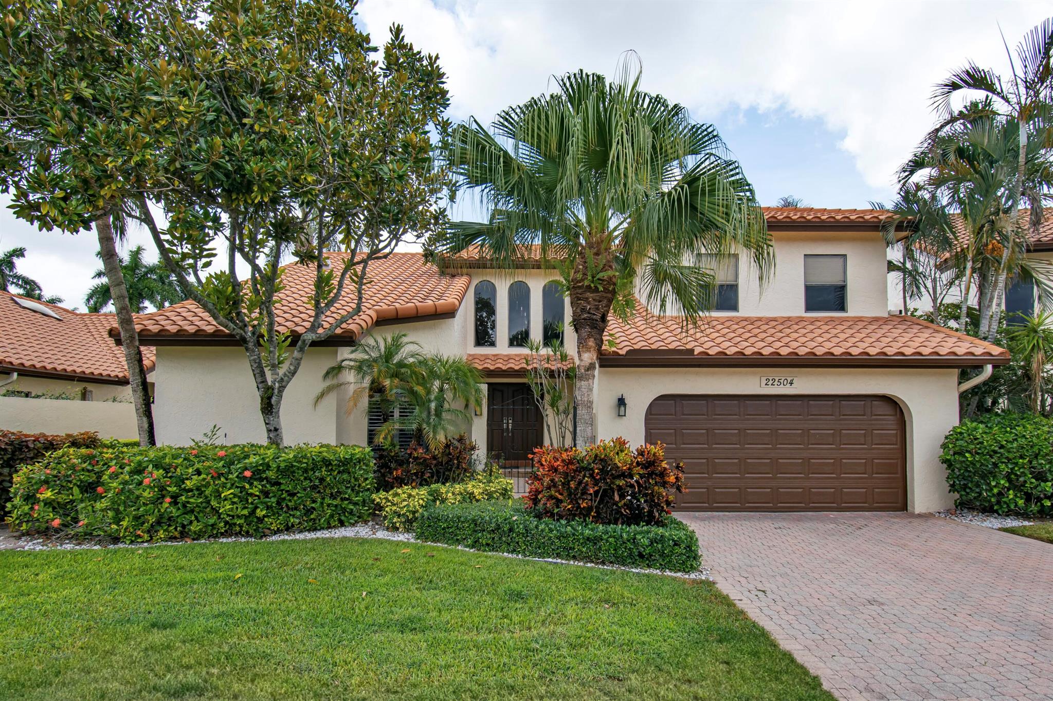 Just listed in the highly desirable, non-mandatory golf community of Boca Pointe! This one-of-a-kind four-bedroom, four-bathroom home in Esplanada Offers over 4000SF,completely renovated inside and out and offers breathtaking, expansive golf course views that are truly unmatched. As you enter, you're welcomed by soaring ceilings and a grand open layout, with formal living and dining spaces that set the tone for elegance and comfort.The home features one spacious guest bedroom and full bath on the first floor, in addition to a luxurious primary suite with bamboo flooring, two walk-in closets, a spa-inspired bathroom with a freestanding soaking tub, frameless glass shower, quartz double vanities, and a private water closet. Porcelain tile is laid in a beautiful staggered pattern