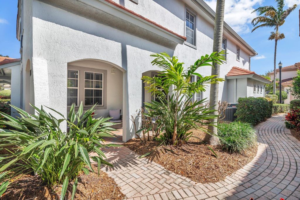 Photo of 128 Evergrene Parkway #5-B, Palm Beach Gardens, FL 33410 (MLS # R10966774)