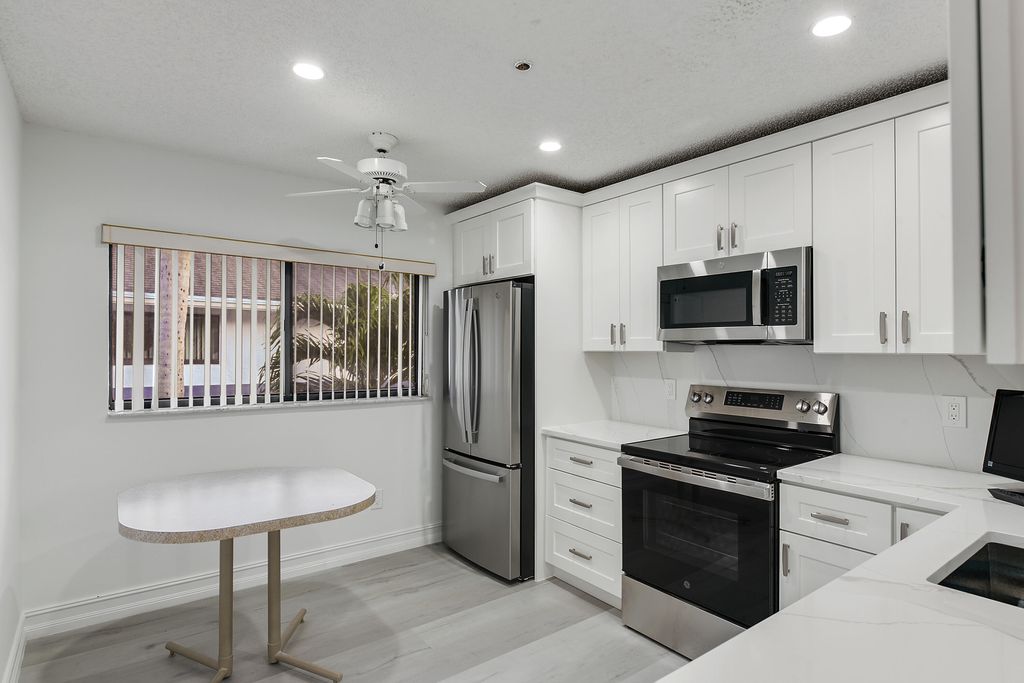 Photo of 15342 Lakes Of Delray Boulevard #98, Delray Beach, FL 33484 (MLS # R11156964)