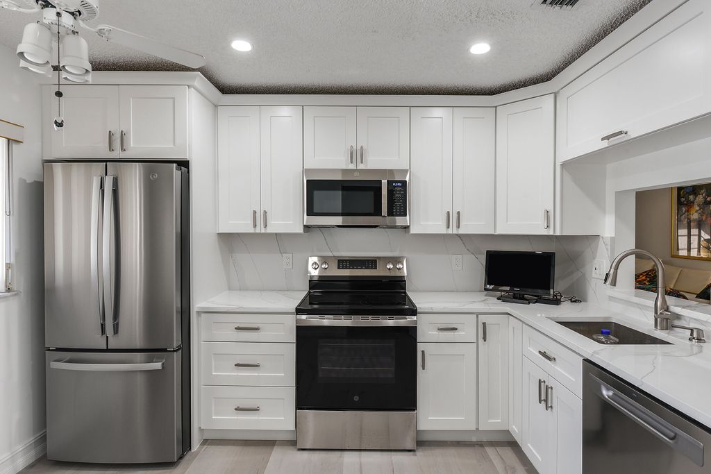 Photo of 15342 Lakes Of Delray Boulevard #98, Delray Beach, FL 33484 (MLS # R11156964)