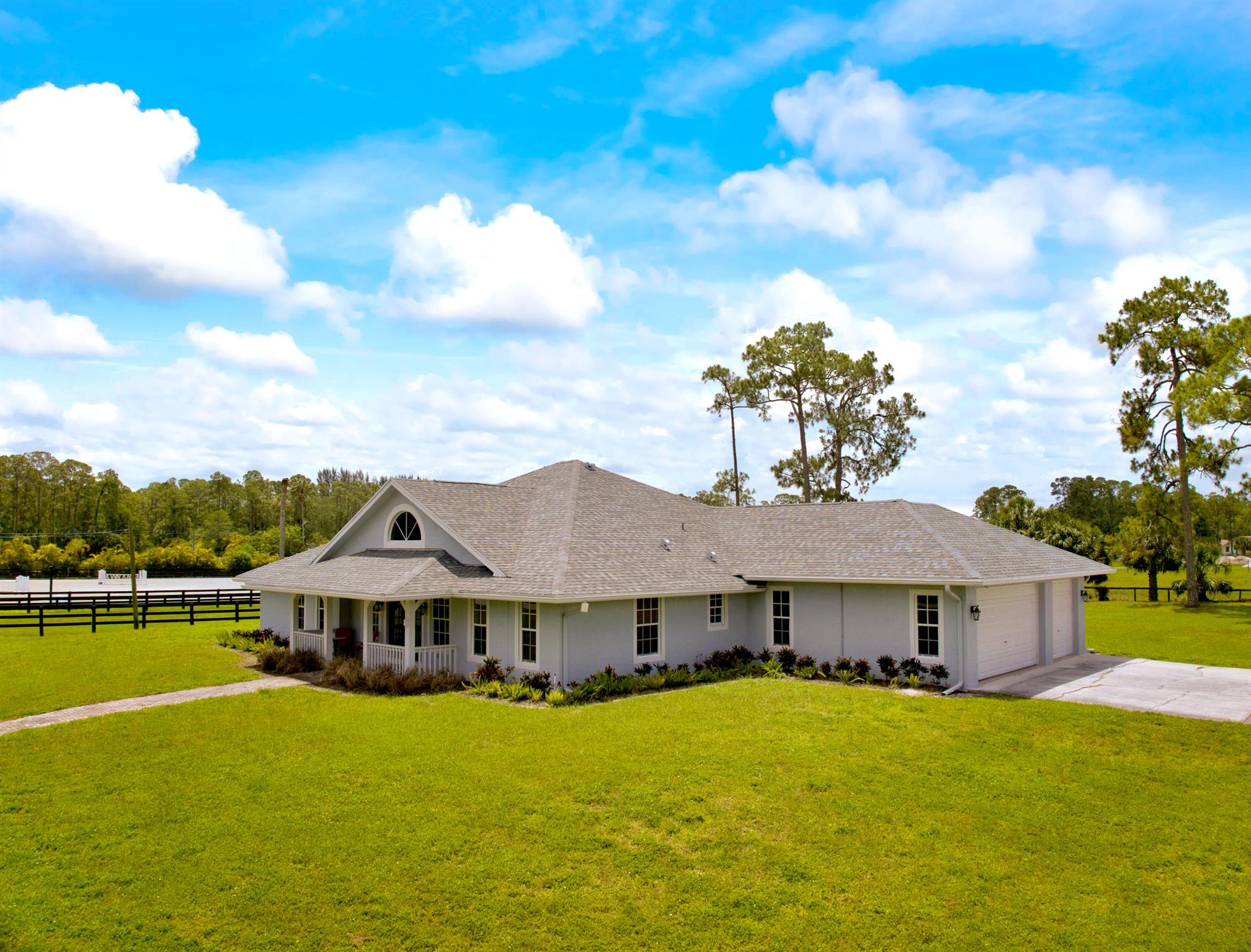 Fully furnished 4-bedroom, 2-bath single-family home available for short-term rental this summer in Loxahatchee. Enjoy a private, fenced-in pool and plenty of space, as the home is located within a larger equestrian property. Peaceful setting, perfect for those looking to relax and unwind. Great option for anyone needing a short-term rental with room to spread out.