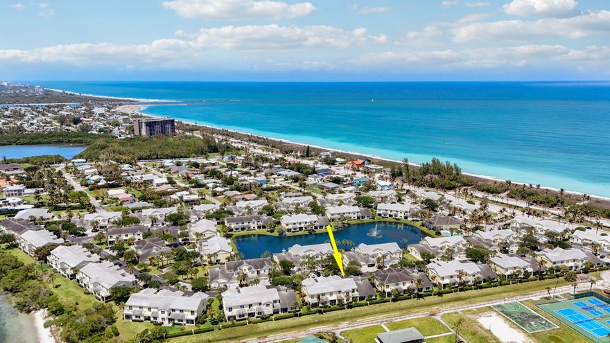 MARINER BAY CHARMER! Updated & spacious townhouse just STEPS TO THE BEACH on Hutchinson Island! Make this property your full time beach retreat or Island getaway! Featuring 3BR+Loft+Den/2.5BA/2CG and multiple outdoor spaces, this home will catch your eye and has room for everyone. Updates include hard surface flooring t/o, new A/C & WH, newer kitchen appliances and W/D, neutral interior paint t/o, updated lighting & fans and newer roof. This spacious Fenwick floor plan features the master suite on the first floor. Kitchen opens to the living room & dining area and has white cabinetry, granite counters, SS appliances, under counter beverage refrigerator, tiled backsplash and breakfast bar seating. Two additional bedrooms, a den, loft space and multiple balconies are located upstairs.  Enjoy river views while having a glass of the wine and watching the sun set from the upstairs patio space. Other special features include in unit laundry, a two car garage, impact glass windows & doors upstairs, storm shutters for the first level and a main level powder bath - perfect for entertaining. Mariner Bay is a gated community nestled between the Intracoastal waterway and Atlantic Ocean. You'll find many amenities including a marina where boat slips can be purchased or leased, a community pool, clubhouse with gym, sauna, kitchen and gathering room. HOA dues include roof, building insurance, lawn care, gated security, common areas and access to the amenities. Beach access is located just steps away from your front door, making an oceanside stroll a part of your daily routine. Adjacent to Jaycee Park with pickleball, tennis, basketball, picnic areas, playground, beach area and more. A short walk or bike ride to the jetty, bars, restaurants, downtown Fort Pierce, Jaycee Park and other popular island spots. Don't miss this one! Call today to view.