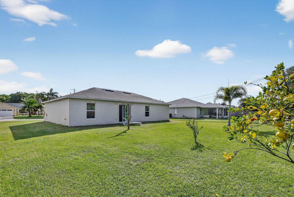 Photo of 1898 SE Mantua Street, Port Saint Lucie, FL 34952 (MLS # R11140675)