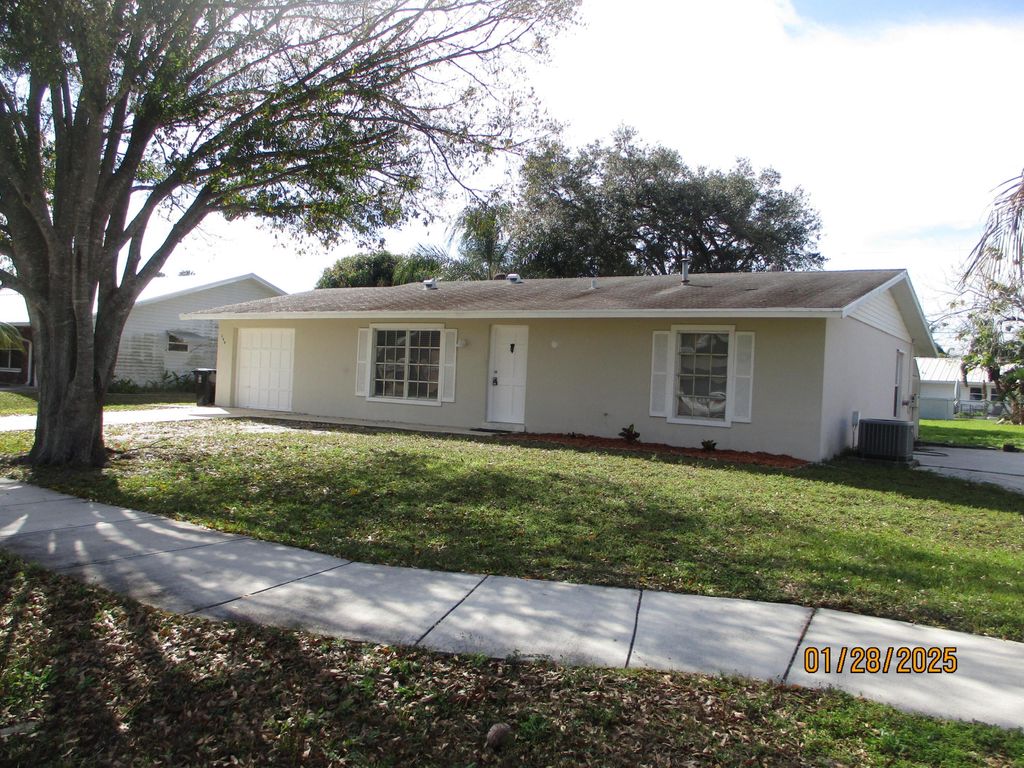 Photo of 166 NW Curtis Street, Port Saint Lucie, FL 34983 (MLS # R11058033)