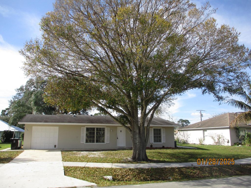 Photo of 166 NW Curtis Street, Port Saint Lucie, FL 34983 (MLS # R11058033)