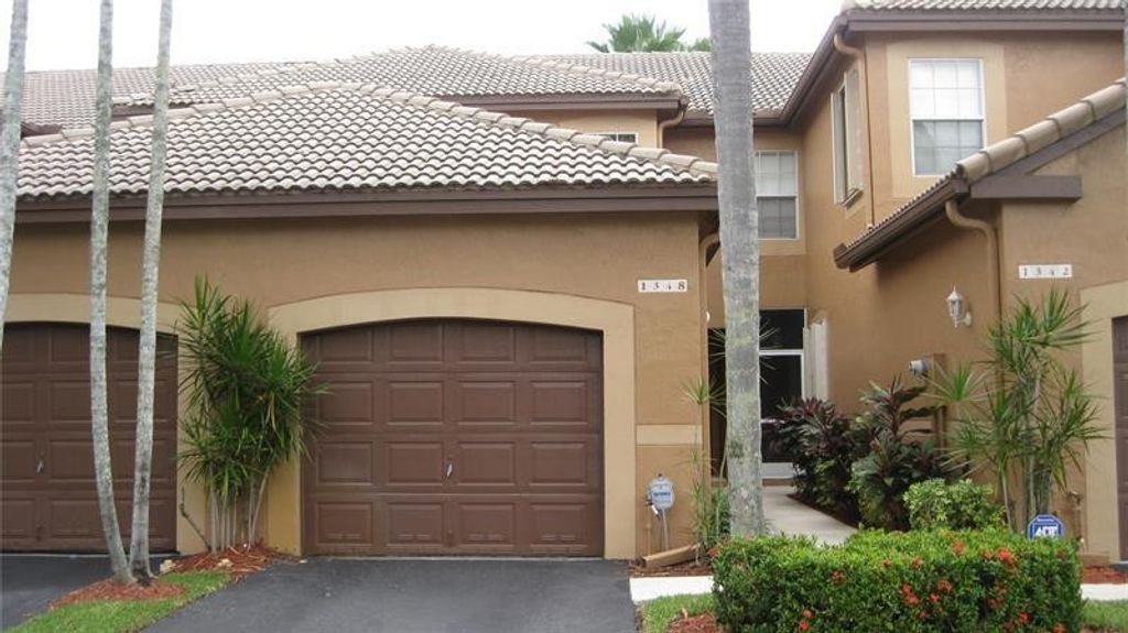 Photo of 1348 Veracruz Lane #4-8, Weston, FL 33327 (MLS # B26027382)