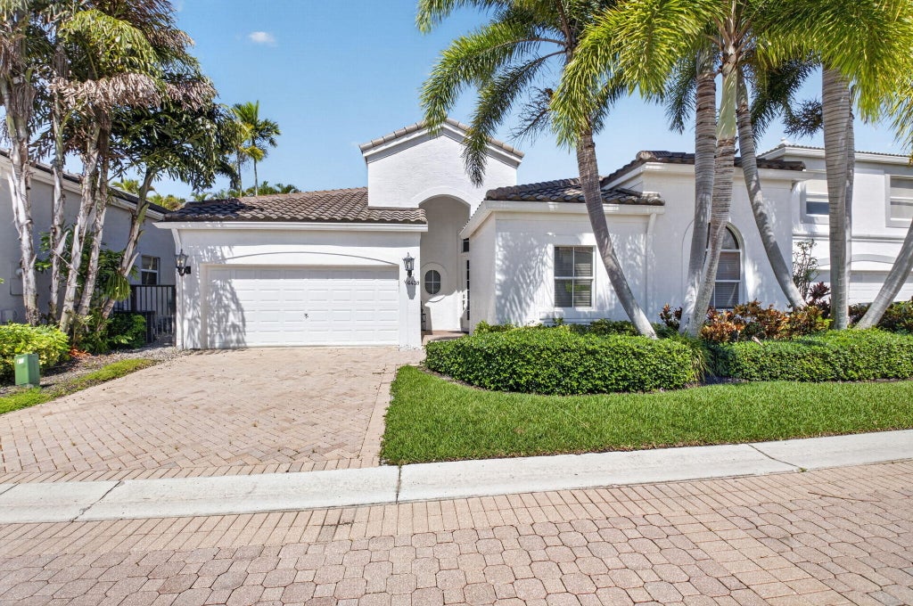 Photo of 6439 NW 43RD Terrace, Boca Raton, FL 33496 (MLS # B26061226)