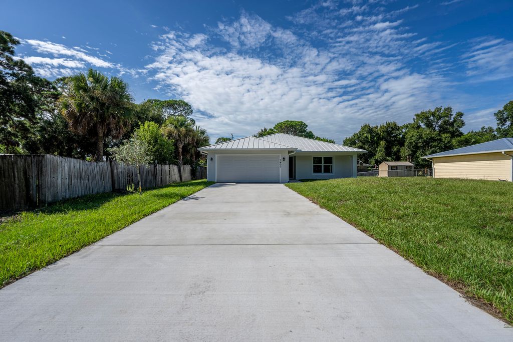 Photo of 8003 Hibiscus Road, Fort Pierce, FL 34951 (MLS # B26026170)