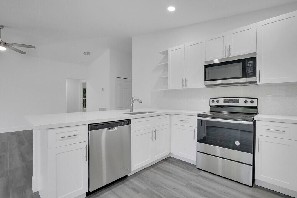 Photo of 8003 Hibiscus Road, Fort Pierce, FL 34951 (MLS # B26026170)