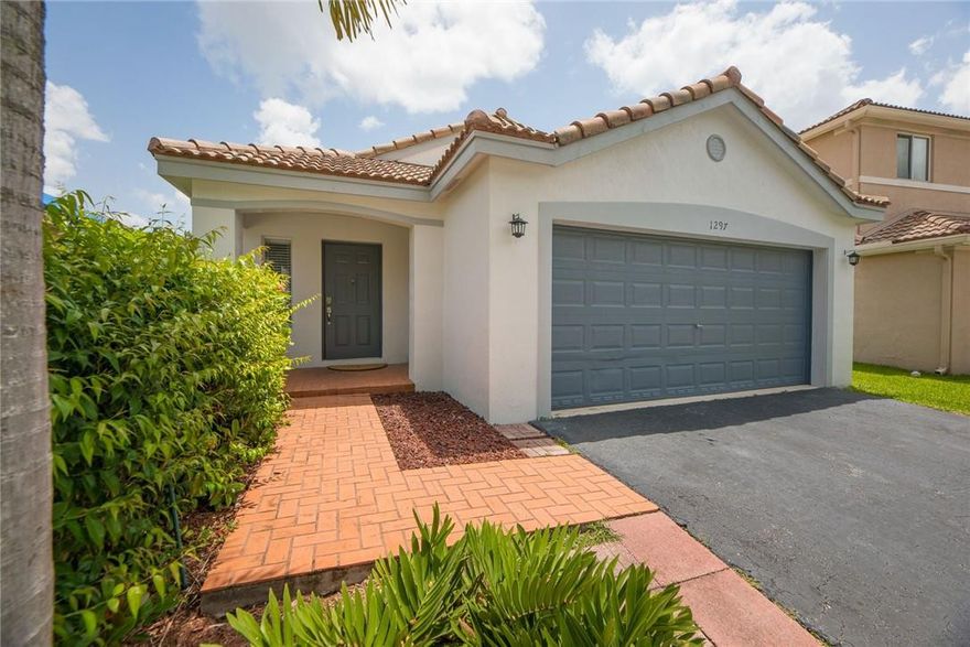 Weston Cul-de-sac living at its finest! Tucked on a gorgeous tree lined street with oversized neighborhood green space right outside your front door. Light and bright 3 bedroom 2 bathroom home with open living space and a cozy vibe. Featuring new floors and neutral colors throughout. Private fenced yard with room to spread out and relax. Access to the most desirable A+ rated schools in Weston. Live like you are on vacation with resort style community amenities including clubhouse, pool, water slide, children’s aquatic play area, mini golf, basketball, playground and more! Located in the highly desirable gated Savanna community. Phenomenal opportunity for investors with wonderful tenants already in place.