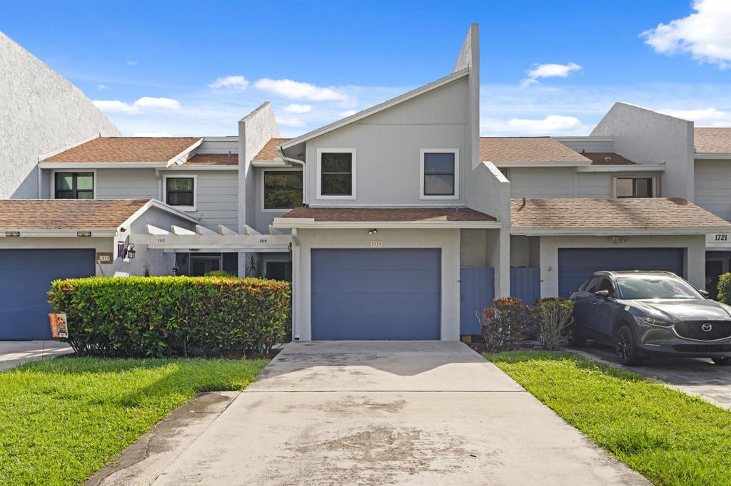 Photo of 1719 Woodbridge Lakes Circle, West Palm Beach, FL 33406 (MLS # R11130221)