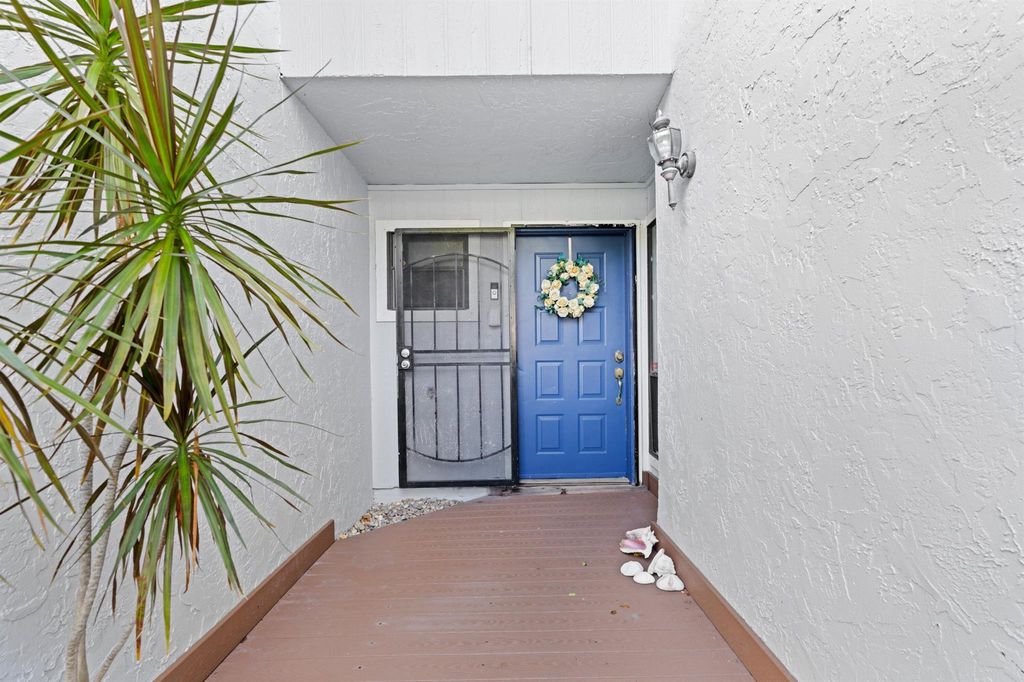 Photo of 1719 Woodbridge Lakes Circle, West Palm Beach, FL 33406 (MLS # R11130221)