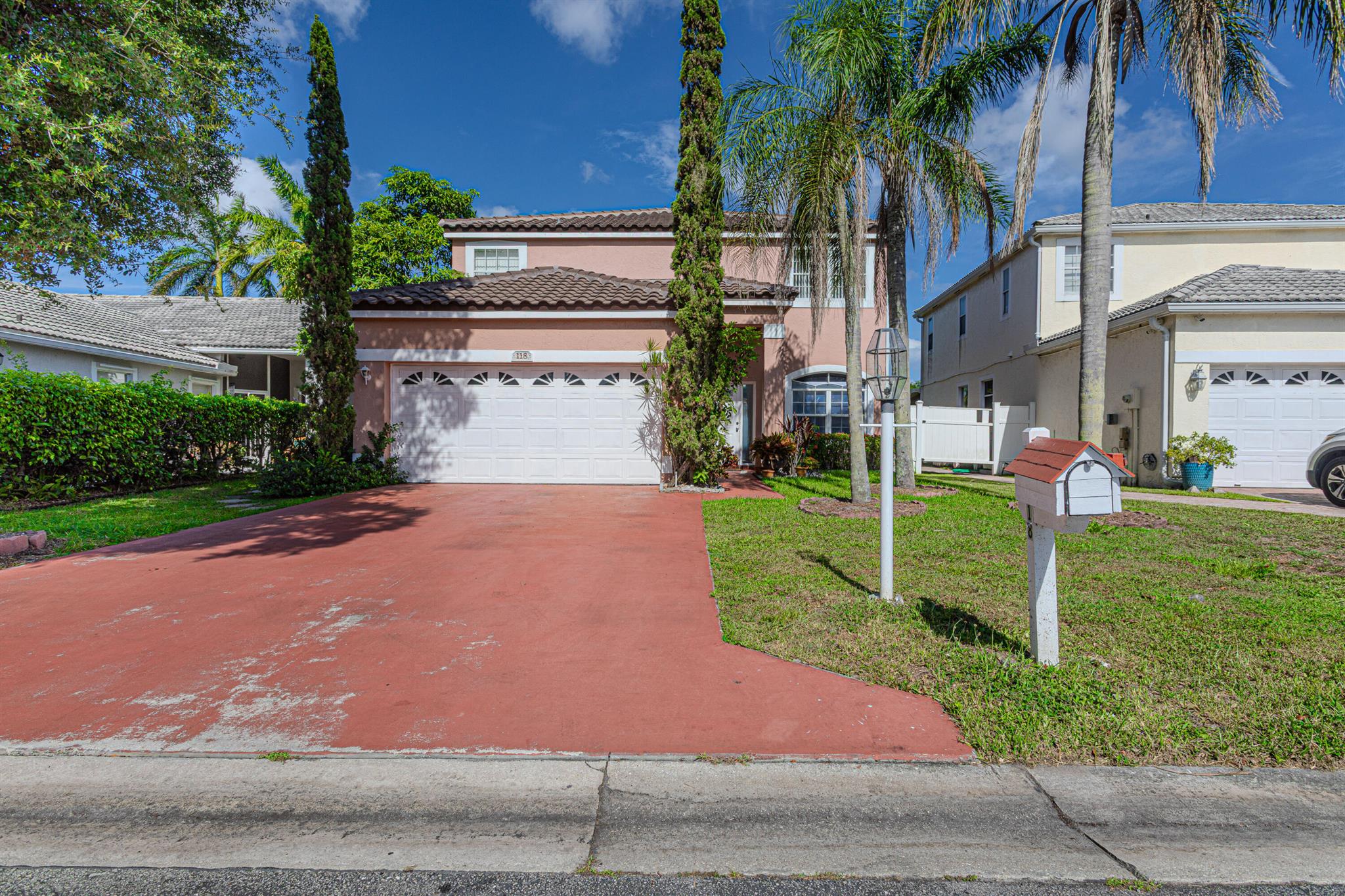 Live where style meets convenience in this upgraded 4-bedroom, 2-bath lakeview beauty in the heart of Greenacres! Located just minutes from schools, parks, shopping, dining, and major highways--this home offers the perfect balance of serenity and accessibility. All bedrooms are privately tucked away upstairs, while the first floor boasts sleek tile throughout, with rich wood flooring on the stairs and second level. The kitchen and bathrooms were upgraded in 2018 with quality wood cabinetry and stainless steel appliances, giving the home a modern yet warm feel. Enjoy morning coffee with a peaceful lake view, and rest easy knowing the roof and A/C were both replaced in 2024. Low HOA includes Comcast basic cable. This one's got the look, the upgrades, and the location--don't miss it!