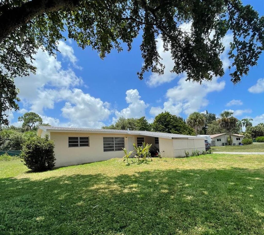 Photo of 151 Henning Drive Dr, West Palm Beach, FL 33406 (MLS # R10824912)