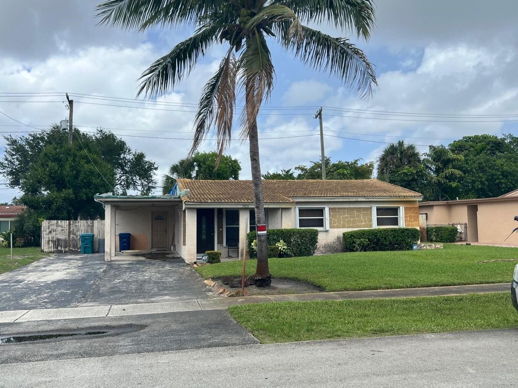 Photo of 3851 NW 4th Place, Lauderhill, FL 33311 (MLS # B26026082)