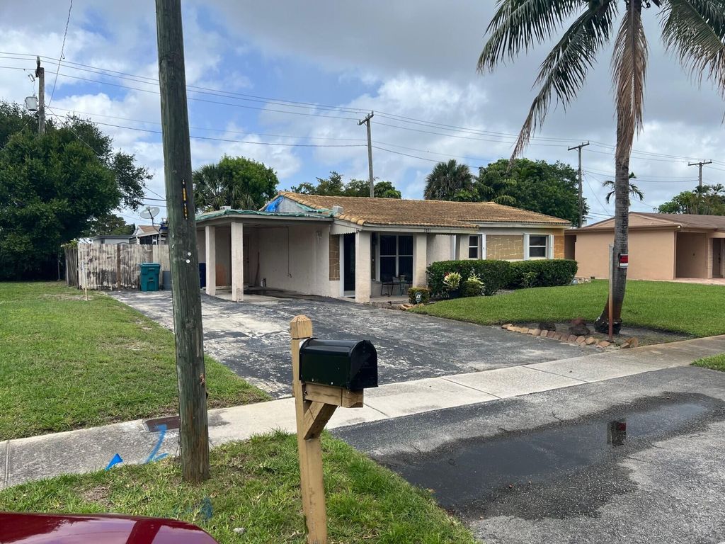 Photo of 3851 NW 4th Place, Lauderhill, FL 33311 (MLS # B26026082)
