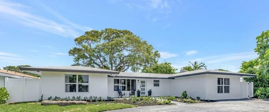 Beautifully Remodeled home on a quiet street with no thru way traffic in Lighthouse Point.   Upon entering the home you are welcomed with gorgeous flooring flowing throughout the home, tons of light entering the home. New Impact windows and doors.  New 2025 Roof, New Kitchen cabinets, quartz countertops, and SS appliance package.  New Ac, New Electrical panel and Service.  The home boasts 3 large bedrooms with oversized closets, 3 Bathrooms plenty of room to add a 4th bedroom,  Walk out your french doors into the private fully fenced backyard with plenty of room for a pool.