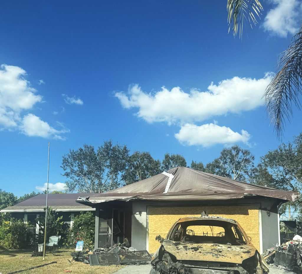 Photo of 2833 SW Seaside Road, Port Saint Lucie, FL 34953 (MLS # B26013776)