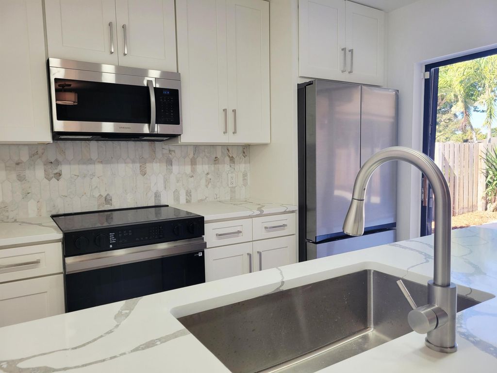 Photo of 201 2nd Way, West Palm Beach, FL 33407 (MLS # R11160023)