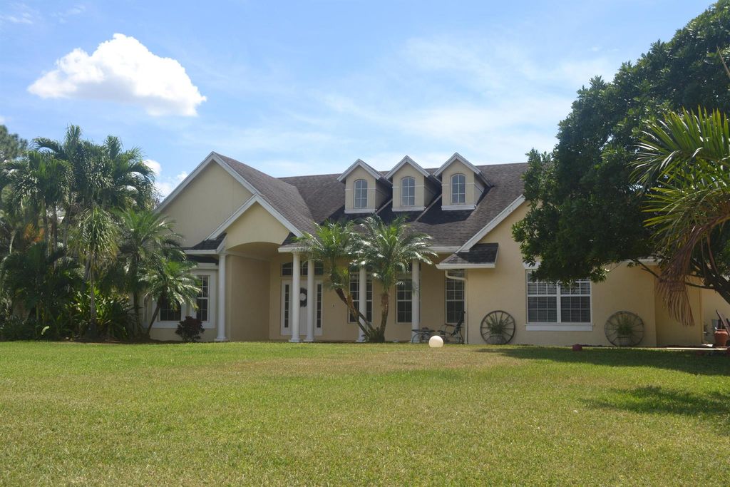 Photo of 17768 Temple Boulevard, Loxahatchee, FL 33470 (MLS # R11082625)