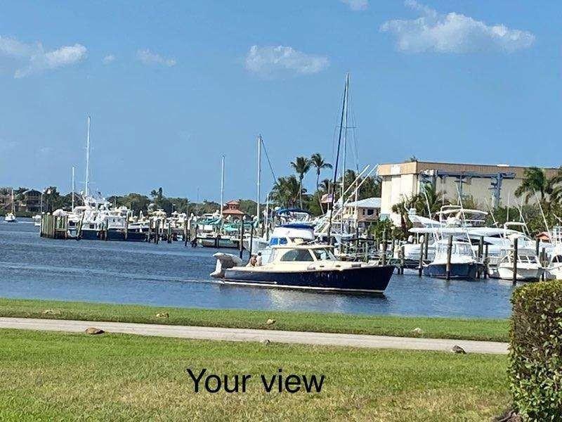 Discover peaceful year-round living in the Port Salerno waterfront district. This charming Port Manatee Condominium is located in the Rocky Point area. Offering the best of coastal Florida living with water views from your glass enclosed lanai. Enjoy the heated community pool, or private dock perfect for fishing or breathtaking sunsets. Parking is conveniently located right at your door. Take a stroll to fine dining, local entertainment, or spend you days exploring nearby parks and beautiful beaches. Downtown Stuart and local theater just a short drive away, giving you the perfect mix of relaxation and activities. This condo is the ideal blend of comfort, convenience and coastal charm.