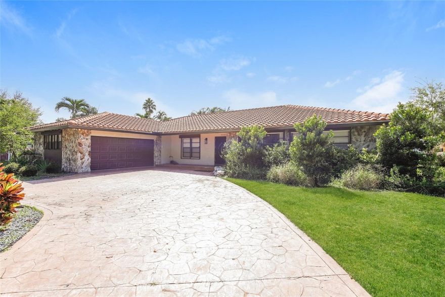 Welcome to your dream home in the heart of Coral Springs! This stunning 4-bedroom, 2-bathroom residence offers the perfect blend of comfort, style, and Florida living.Step inside and be amazed by the spacious open layout, modern finishes, and high-end upgrades throughout. The fully remodeled interior boasts a sleek kitchen with , stainless steel appliances, and custom cabinetry — perfect for entertaining or quiet family dinners.Outside, your private paradise awaits! Enjoy the oversized pool overlooking a serene canal, ideal for relaxing, entertaining, or soaking up the sun. The backyard is fully fenced, offering both privacy and space to play or host gatherings.