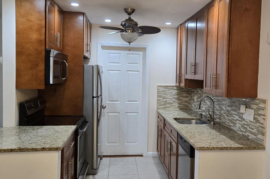 Photo of 114 Leisureville Boulevard, Boynton Beach, FL 33426 (MLS # R11074903)