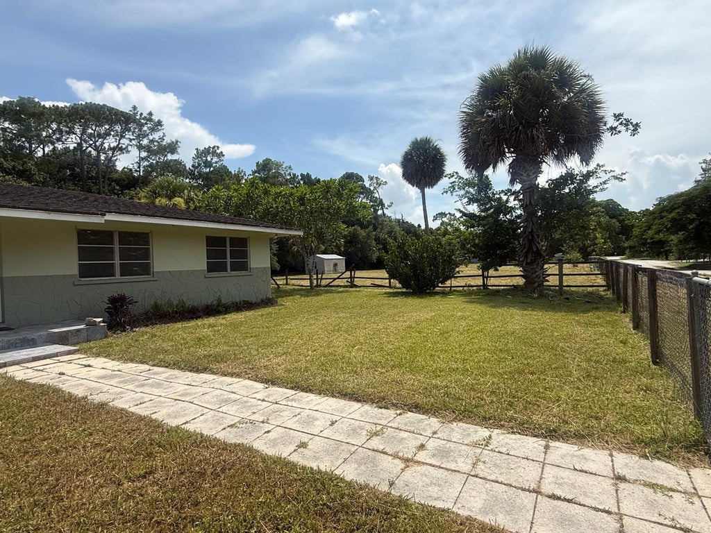 Photo of 13886 N 22ND Road N, Loxahatchee Groves, FL 33470 (MLS # B26056861)