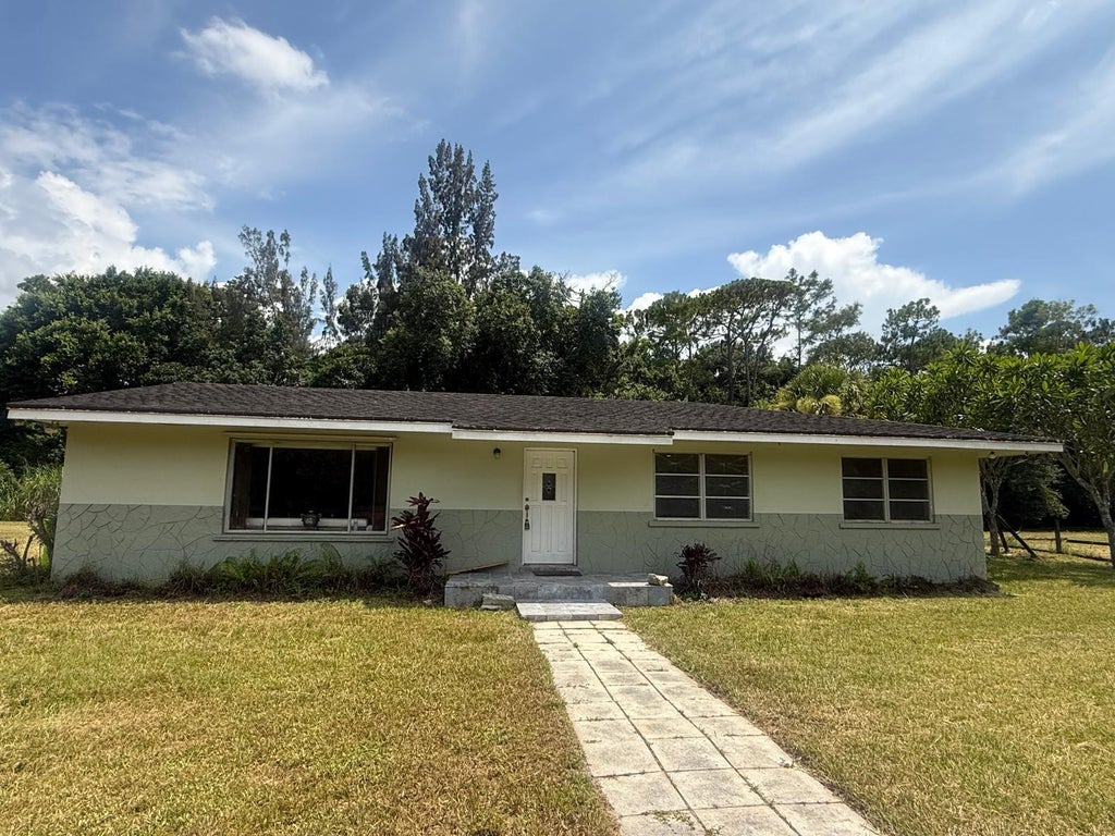Photo of 13886 N 22ND Road N, Loxahatchee Groves, FL 33470 (MLS # B26056861)