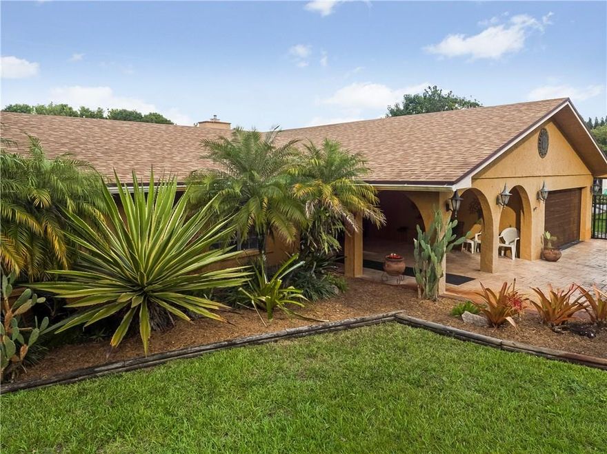 4BR/3BA SITS ON OVERSIZED ACRE PLUS LOT! HORSES,BOATS, BIG TOYS WELCOME! NEW ROOF+GUTTERS IN 2015! WOOD BURNING FIREPLACE! 2 MASTERS/NEW MASTER HAS MARBLE BATH/HUGE WALK-IN AND PGT IMPACT GLASS! ALL CALIFORNIA CLOSETS! GRANITE KITCHEN! DEEP WELL-REVERSE OSMOSIS! A/C IN 2014,UPGRADED ELECTRICAL. HUGE COVERED SCREENED PATIO! HEATED POOL. BARN+TACK RM, IRON FRONT GATE +DOUBLE GATE WITH ACCESS TO THE BACK. RAISED BED FOR LARGE GARDEN! BUILT-IN FIRE PIT! 2016 SOLAR WATER HEATER! UPDATED RAISED PANEL DOORS, CROWN MOLDING, WOOD FLOORS IN BEDROOMS, UPDATED BATHROOMS! MATURE FRUIT TREES! ACCESS TO DAVIE'S TRAIL SYSTEM! EXCELLENT SCHOOLS, COUNTRY ISLES ELEMENTARY!