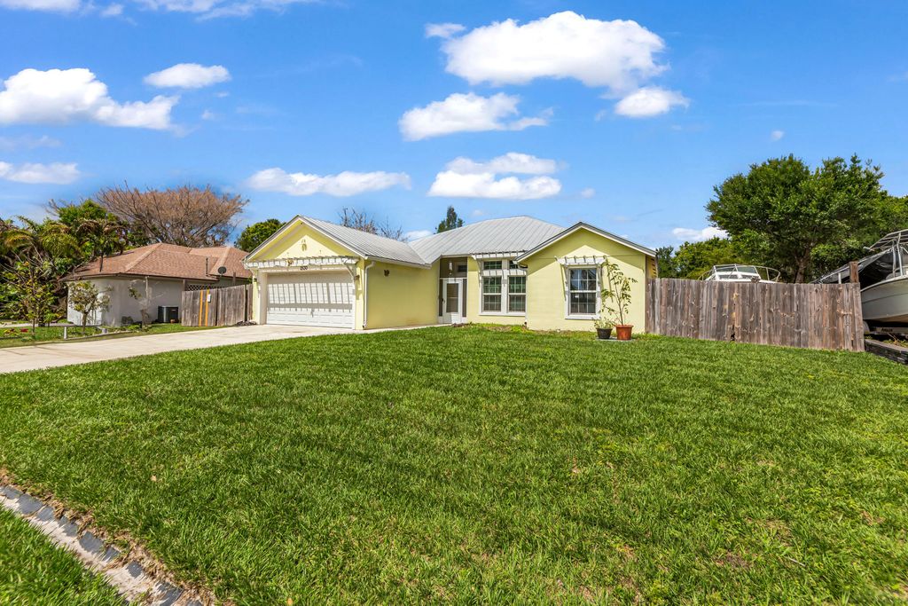 Photo of 2530 SE Hemsing Street, Port Saint Lucie, FL 34984 (MLS # B26017107)