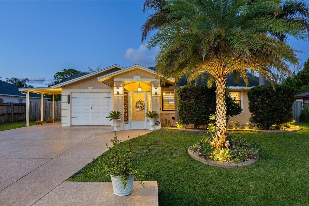 Photo of 1849 SW Burlington Street, Port Saint Lucie, FL 34984 (MLS # B26038193)