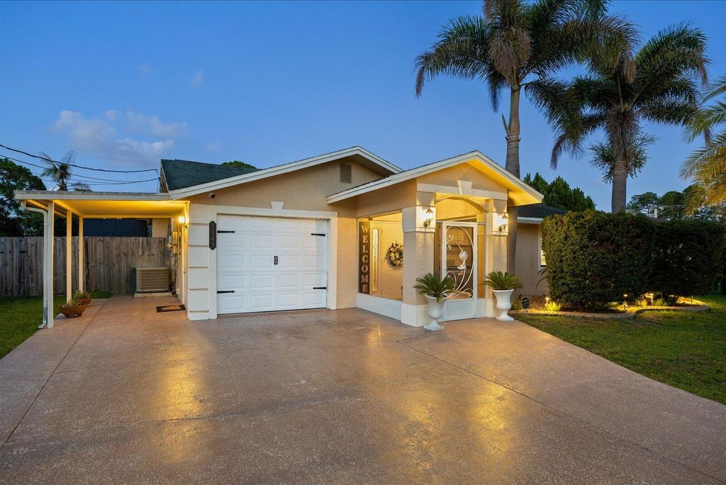 Photo of 1849 SW Burlington Street, Port Saint Lucie, FL 34984 (MLS # B26038193)
