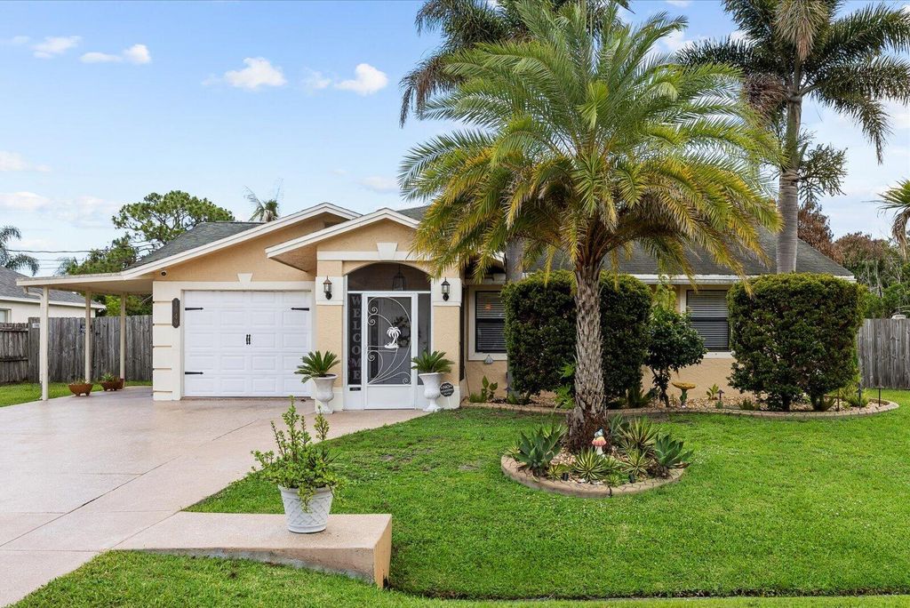 Photo of 1849 SW Burlington Street, Port Saint Lucie, FL 34984 (MLS # B26038193)