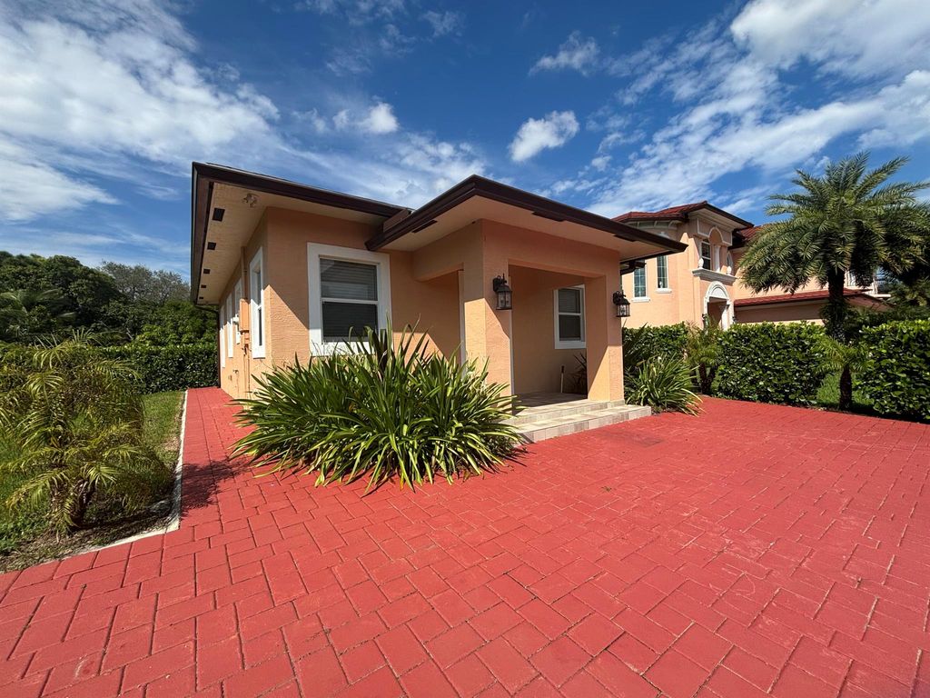 Photo of 4649 Lillian Avenue #A, Palm Beach Gardens, FL 33418 (MLS # R11024061)