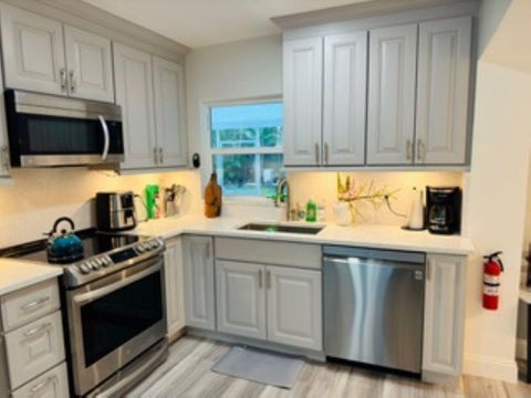 Photo of 200 NE 56th Street #200, Oakland Park, FL 33334 (MLS # R11136253)