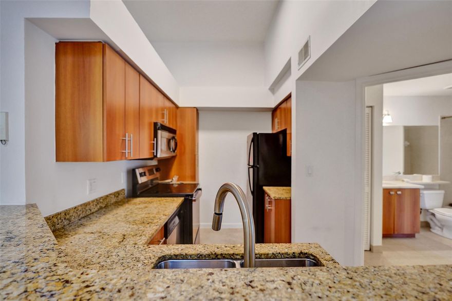 Central Delray Beach location!! Located in Bahia at Delray, a gated community with a pool, gym, volleyball, and tennis courts. Unit has been updated and is turn key ready for move iN. Upgrades include, paint/removal of popcorn ceilings, new washer/dryer, updated plumbing, new stove, new water heater, and fulled serviced newer AC. Beautiful clean and bright unit with high ceilings and ready to call home!! Close to shopping/restaurants and wonderful family friendly community. Also for sale!
