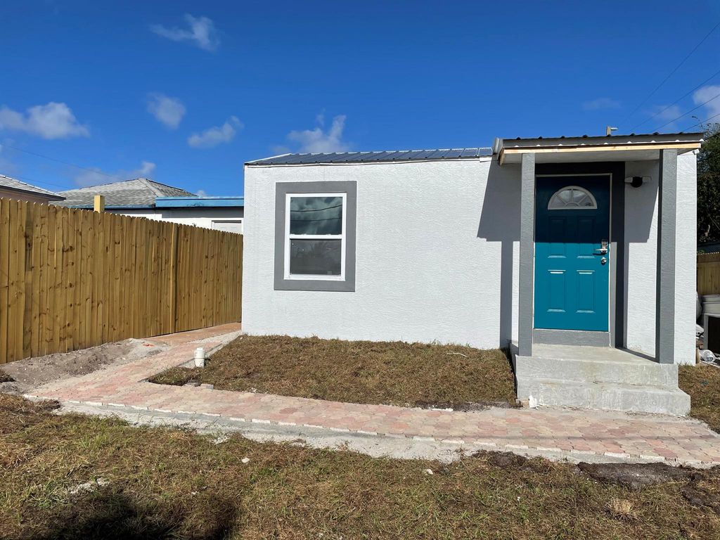 Photo of 825 W 3rd Street #4, Riviera Beach, FL 33404 (MLS # R11132650)