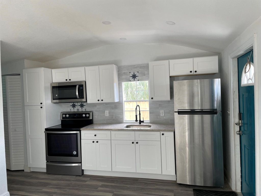 Photo of 825 W 3rd Street #4, Riviera Beach, FL 33404 (MLS # R11132650)