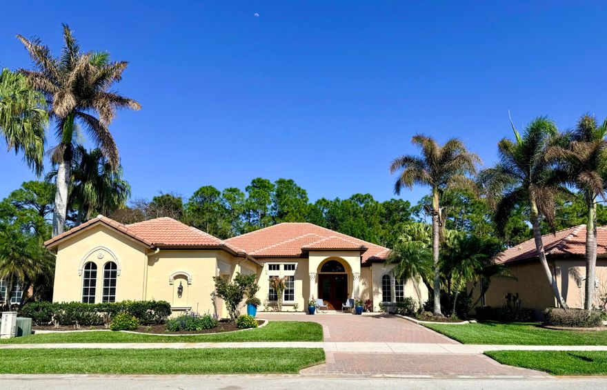 Renovated 4BR/3BA home with 3-car garage in the gated community of The Vineyards in Port Saint Lucie. Quiet cul-de-sac setting with peaceful preserve views. Travertine-tiled entry and double impact-rated glass doors create an elegant welcome. Formal living and dining rooms open to outdoor space through sliding glass doors. Updated kitchen with custom inset cabinetry, quartzite countertops, new appliances, and a Signature 36-in counter-depth refrigerator. Separate bar area with matching inset cabinetry and quartzite surfaces. Tile flooring throughout. Spacious primary suite with 2'x4' porcelain tile, dual closets, and renovated bath. Bathrooms updated throughout. PGT impact windows, impact-rated doors, new AC units, fresh interior paint, and laundry room with front-load washer and dryer. Minutes to I-95 and US-1.
