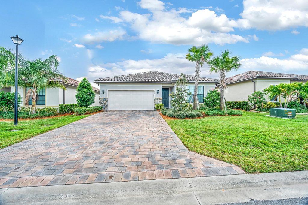 Photo of 680 SE Villandry Way, Port Saint Lucie, FL 34984 (MLS # R11145274)