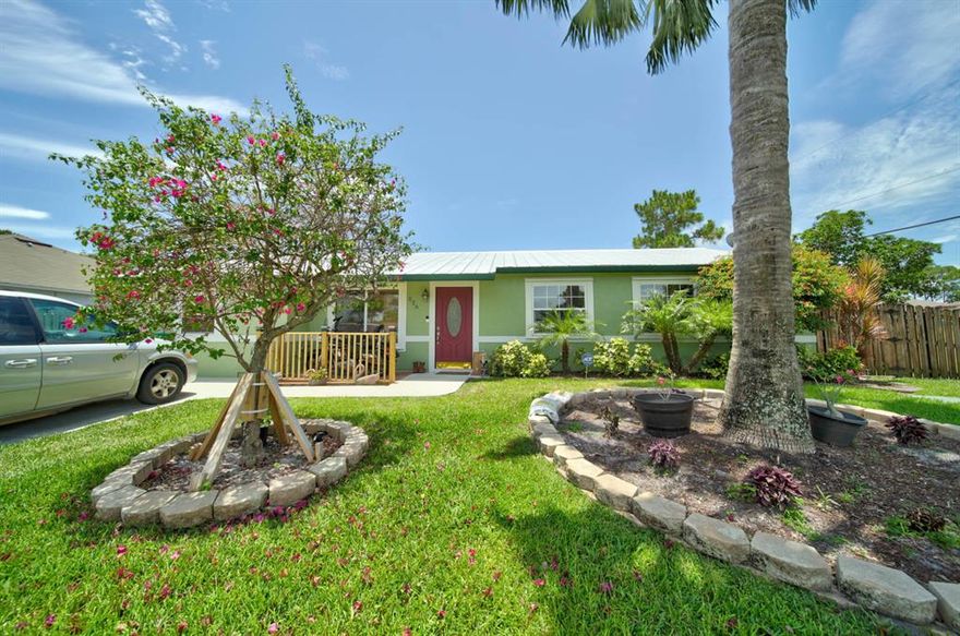 Beautifully maintained pool home in the heart of Port St Lucie.  15 min from the beach and 10 minutes from US1 shopping.  This move in ready home features updated kitchen and baths, tile throughout the home, oversized screened in lanai  and a metal roof.  Relax in the backyard by the pool or have your morning coffee watching the fish in the koi pond.  This home is currently occupied by tenants with a lease until February.  Buyer to honor current lease. Garage converted to living space. tenant's paying 1550