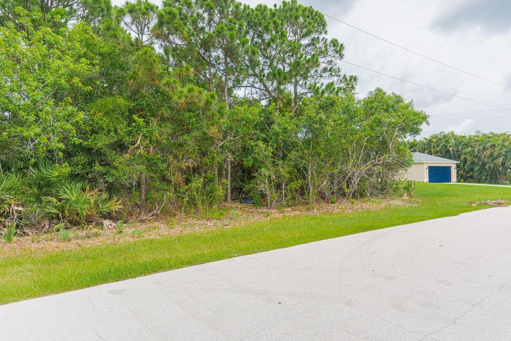 Photo of 2262 SE Rock Springs Drive, Port Saint Lucie, FL 34952 (MLS # R11003682)