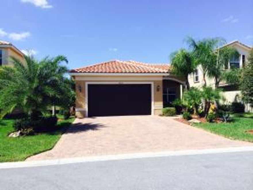 SITED ON PRIVATE LAKE LOT,THIS ONE STORY OPEN FLOOR PLAN HOME HAS GORGEOUS VIEWS, ENLARGED SCREENED PATIO,INGROUND SPA W/COVER. EASEMENTS ON BOTH SIDES OF HOUSE AFFORD GREAT PRIVACY ON PATIO. RECESSED LIGHTING THROUGHOUT,ALL IMPACT WINDOWS AND DOORS,ALL DIAGONAL TILE,CROWN MOLDING,GOURMET KITCHEN,STAINLESS STEEL APPLIANCES,MASTER BR/BATH WHIRLPOOL TUB,SEP.SHOWER,2 HUGE WALK-IN CLOSETS.FANS IN ALL ROOMS.CLUBHOUSE,TENNIS,PLAYGROUND,OLYMPIC POOL,SPA,ACTIVITIES,MANNED GATE. VERY UPSCALE COMMUNITY, CLOSE TO NEW SHOPPING CENTER FEATURING GREAT RESTAURANTS, AND ALL YOUR SHOPPING NEEDS.