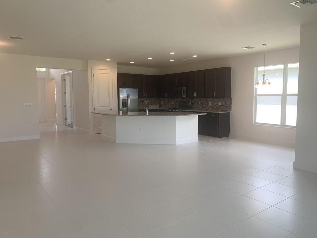 Photo of 11933 SW Poseidon Way, Port St Lucie, FL 34987 (MLS # R11099062)