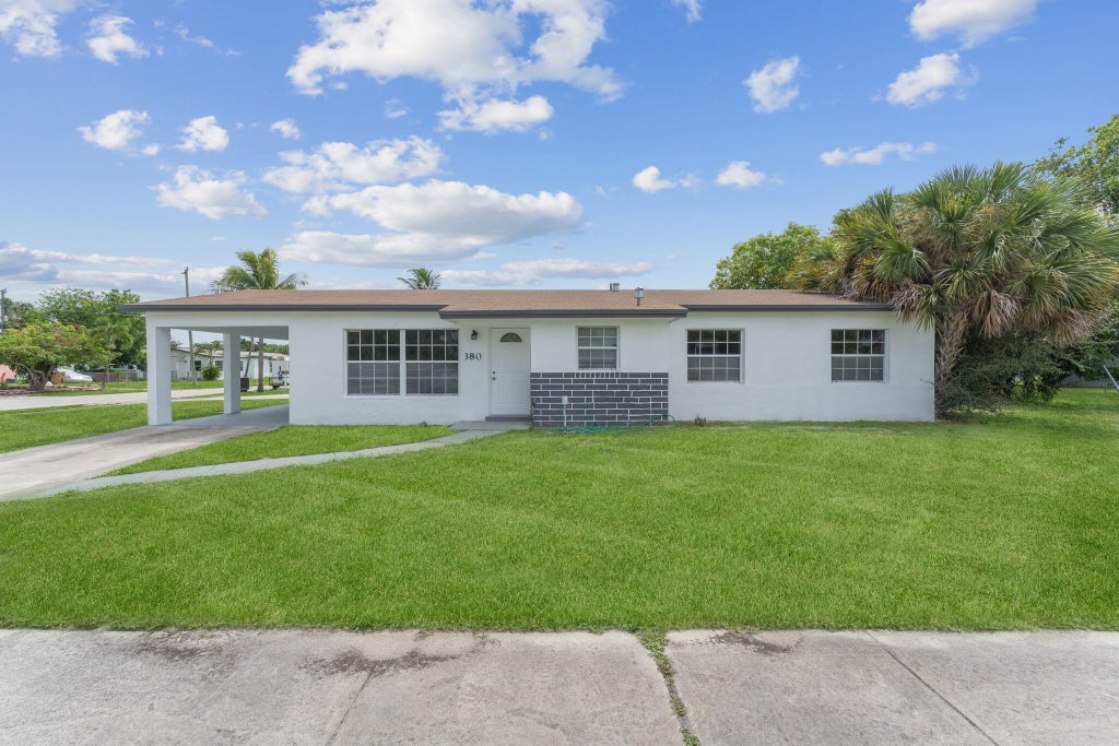 Photo of 380 NW 2nd Way, Deerfield Beach, FL 33441 (MLS # R11023886)