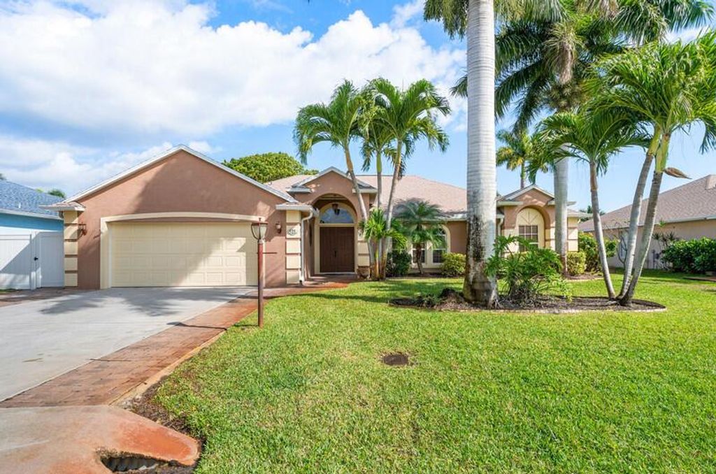 Photo of 525 NE Vanda Terrado, Jensen Beach, FL 34957 (MLS # R10971430)