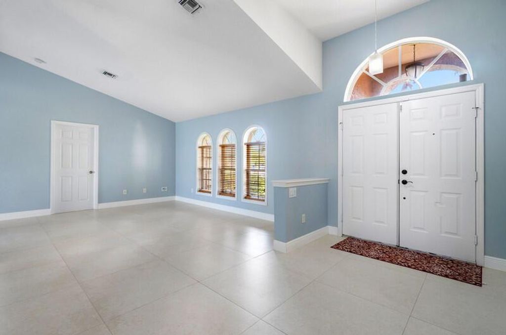 Photo of 525 NE Vanda Terrado, Jensen Beach, FL 34957 (MLS # R10971430)