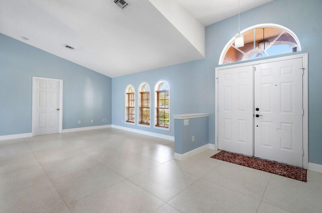 Photo of 525 NE Vanda Terrado, Jensen Beach, FL 34957 (MLS # R10971430)